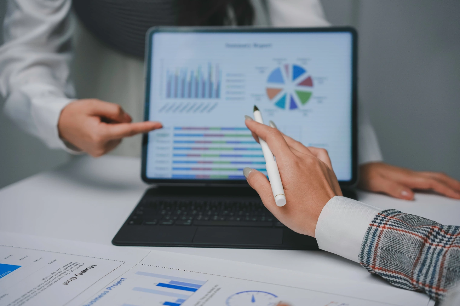 businesswomen-analyzing-financial-data-on-tablet-a-2026-01-08-06-09-40-utc (1).jpg
